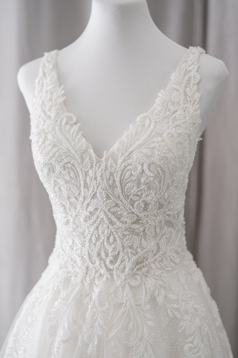 v-neck beaded lace wedding gown