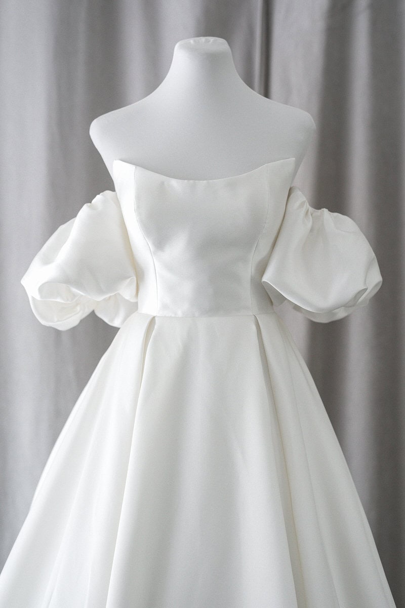 scoop neckline puff sleeves minimalist satin wedding gown